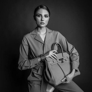 Adela M.