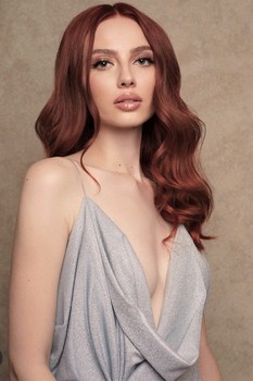 Adela M.