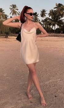 Adela M.