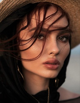 Adela M.