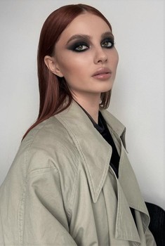 Adela M.