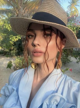Adela M.
