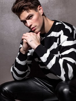 Adrian K.