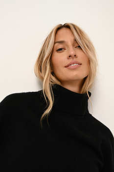 Laura M.
